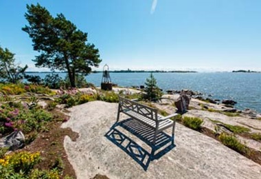 Empty bench on the rock